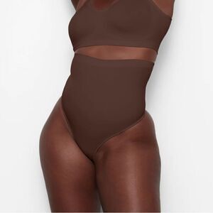 SKIMS Seamless Sculpt High-waisted Thong In Cocoa Brown Shaping Shapewear